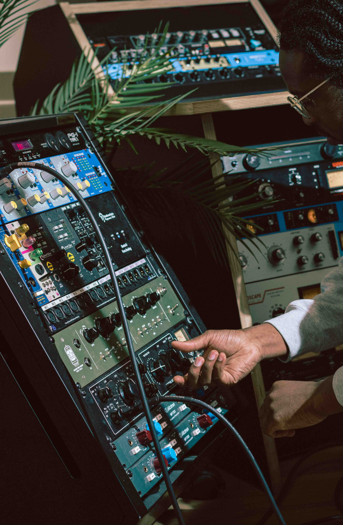 Engineer with outboard preamps